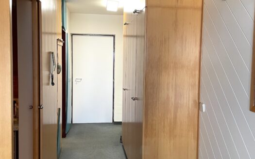 Kompakte 1-Zimmer-Wohnung im letzten Obergeschoss in der Ossiacher Zeile